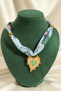 Scarf necklace with charms
